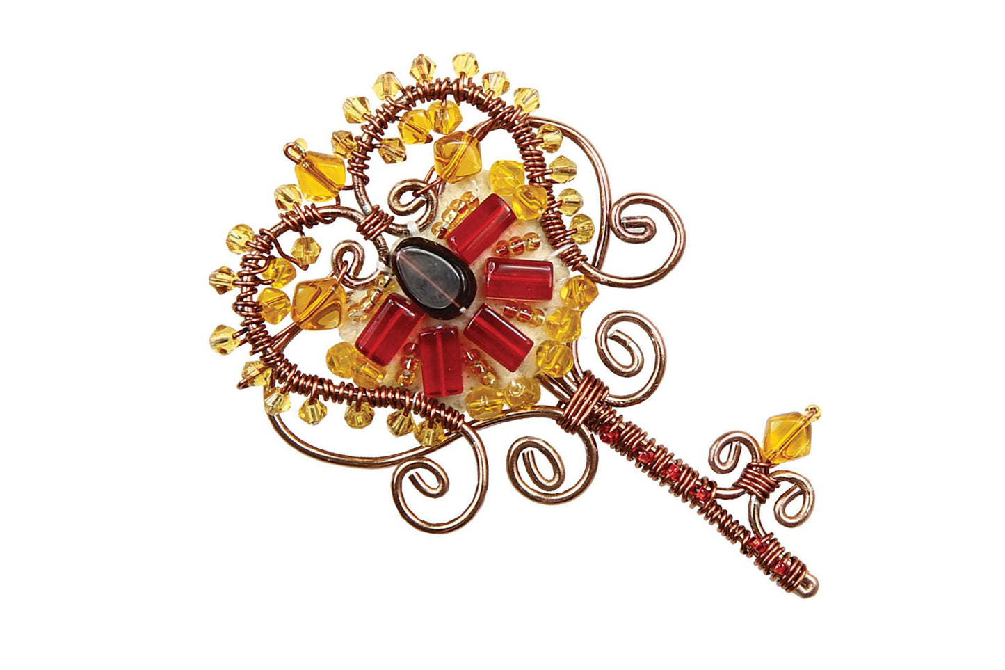 a brooch with a red and yellow flower on it