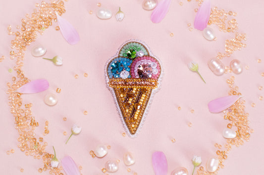 an ice cream cone with a variety of toppings