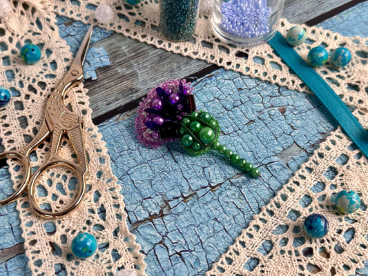 a pair of scissors sitting on top of a table