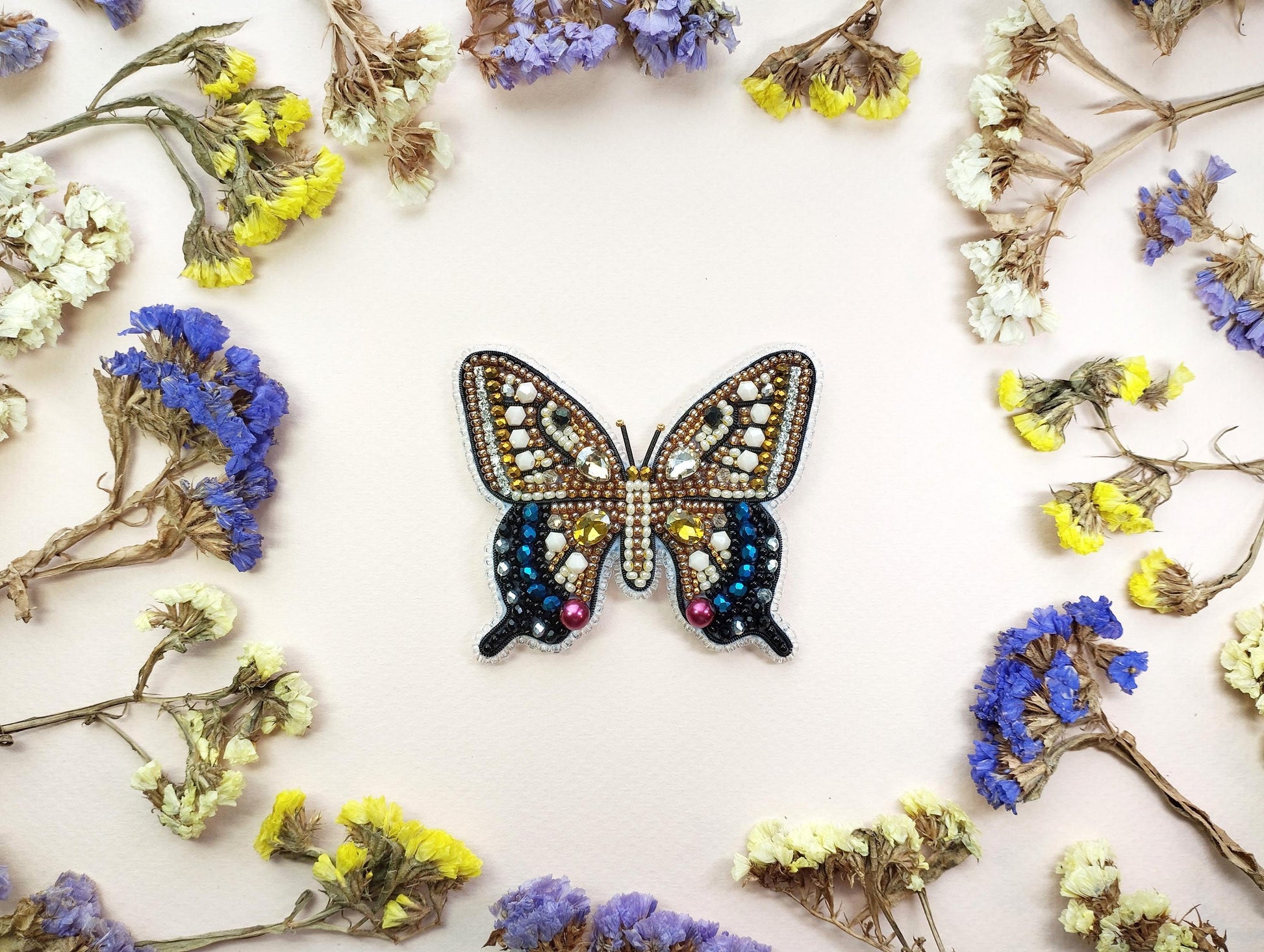 a picture of a butterfly made out of flowers