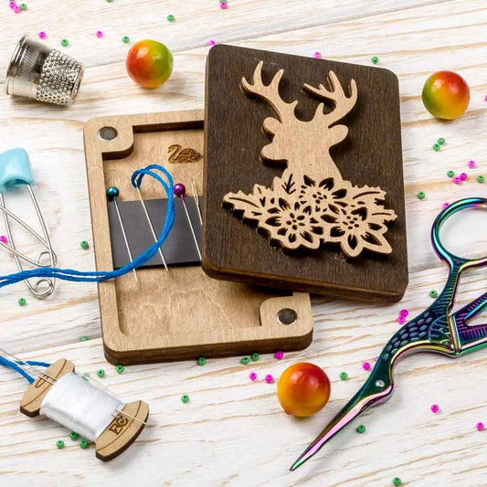 a wooden cutting board with a deer head on it