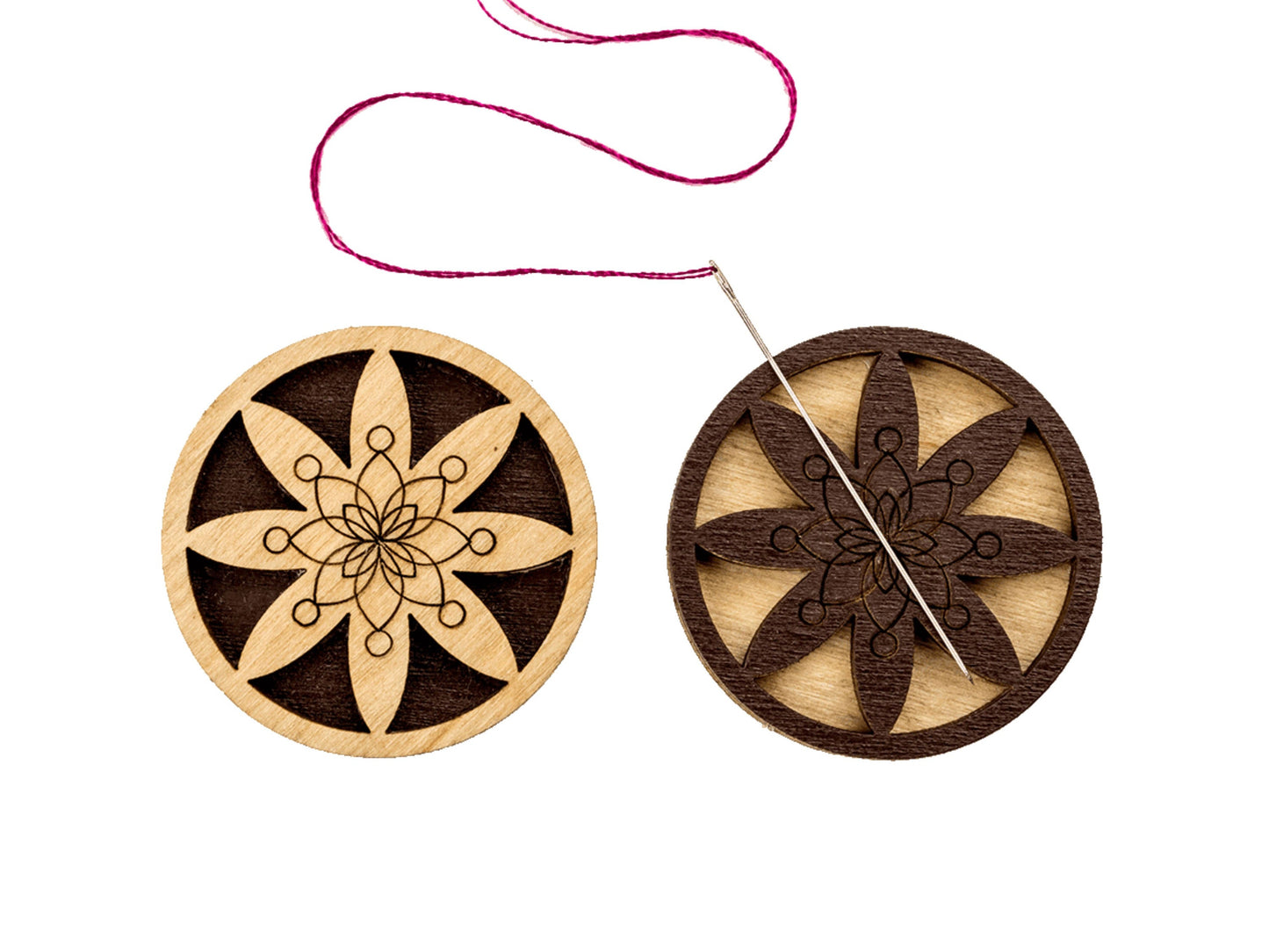 a wooden ornament with a string attached to it