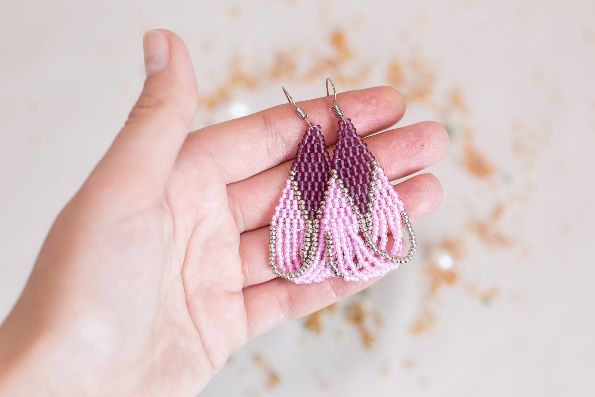 a bunch of earrings that are on a table