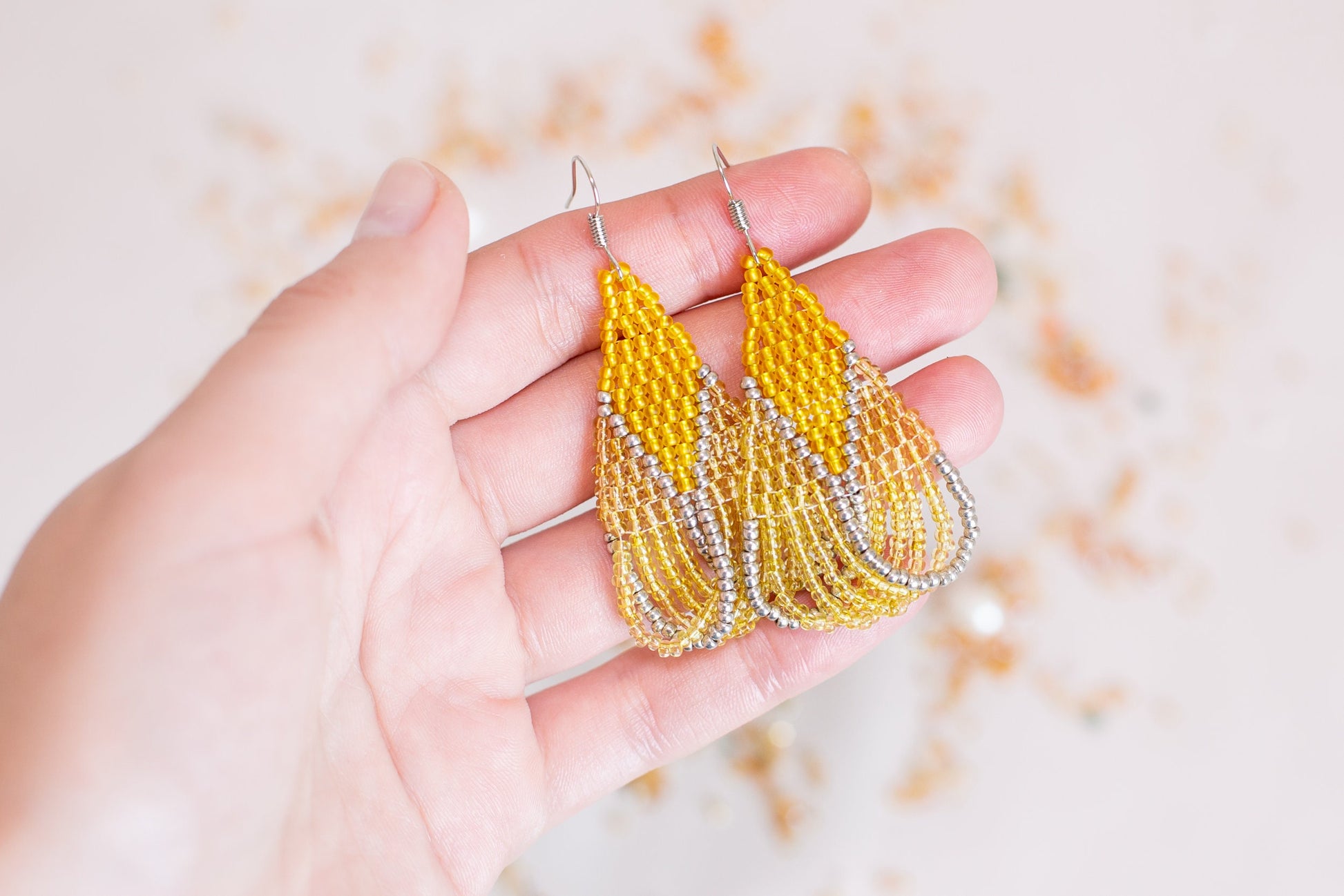 a bunch of earrings that are on a table