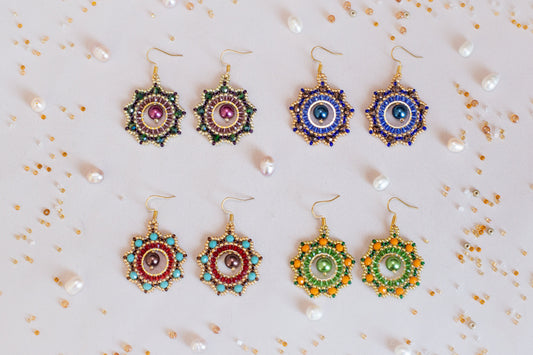 a set of four pairs of beaded earrings