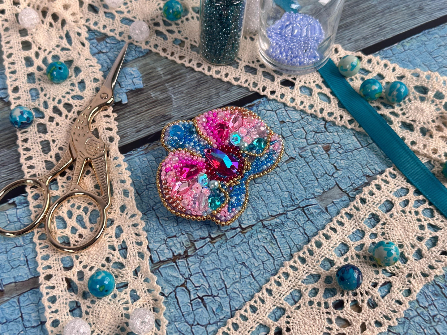 a pair of scissors sitting on top of a table