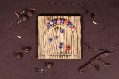 a wooden board with a bunch of buttons on it