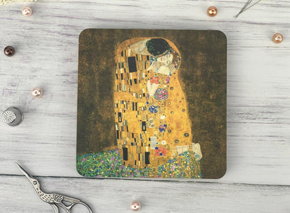 a mouse pad with a painting of a woman&#39;s face