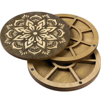 a set of three wooden coasters sitting on top of each other