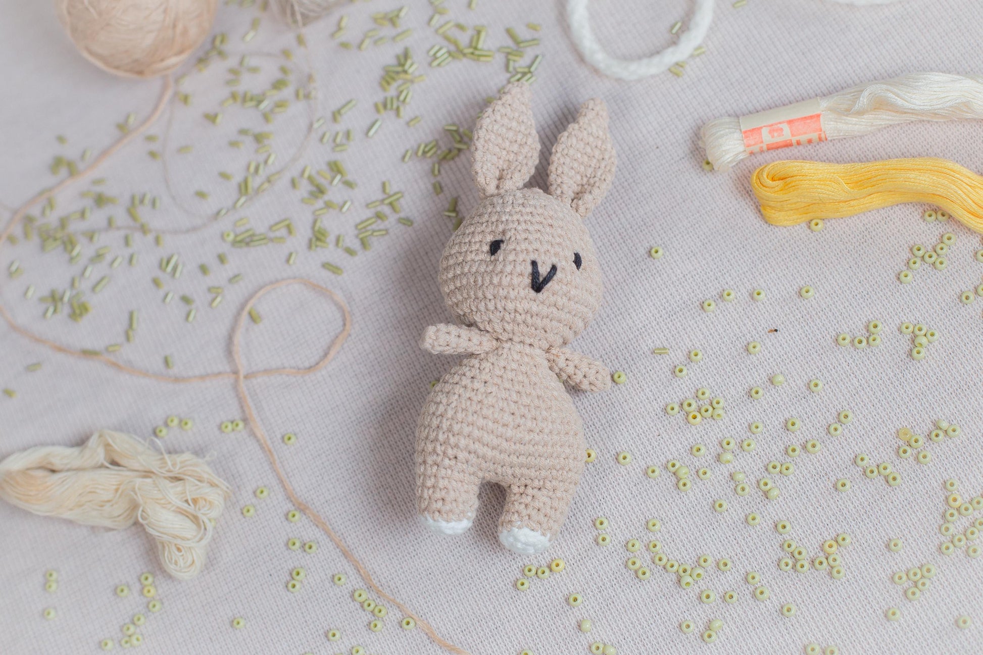 a crocheted stuffed animal sitting on top of a table