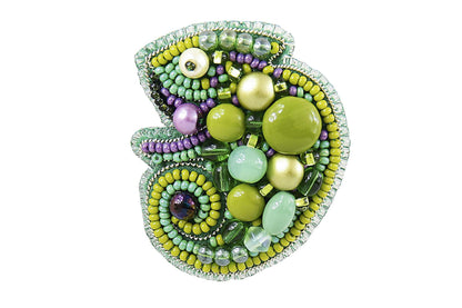 a brooch with beads and beads on it