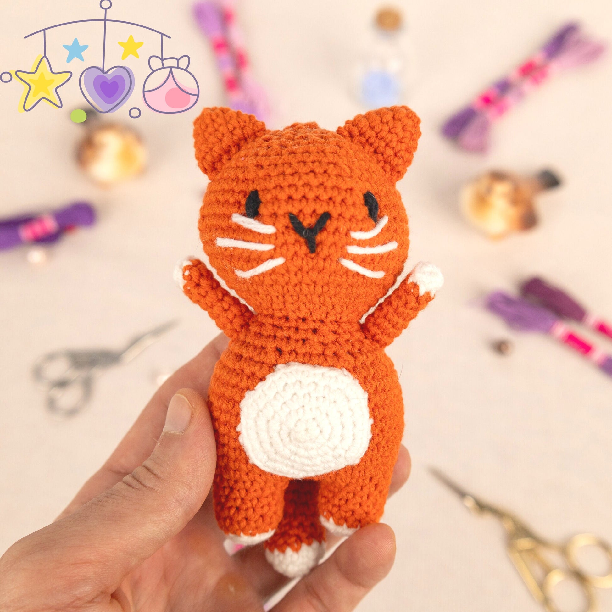 a table topped with lots of craft supplies