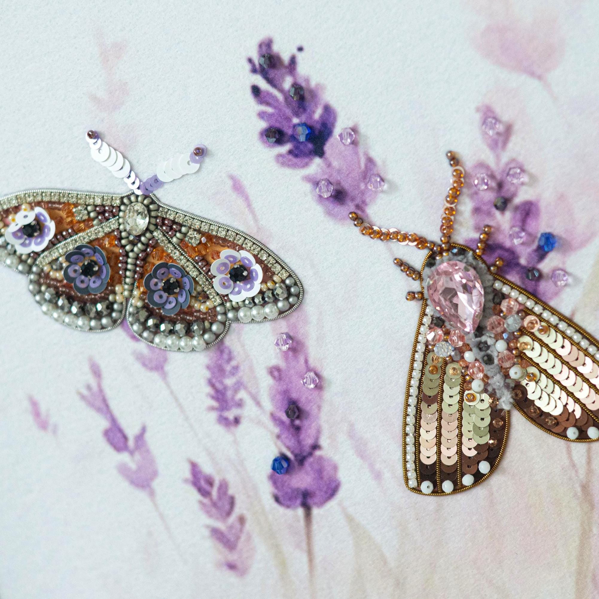 a picture of a picture of two moths