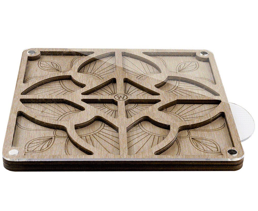 a wooden coaster with a design on it