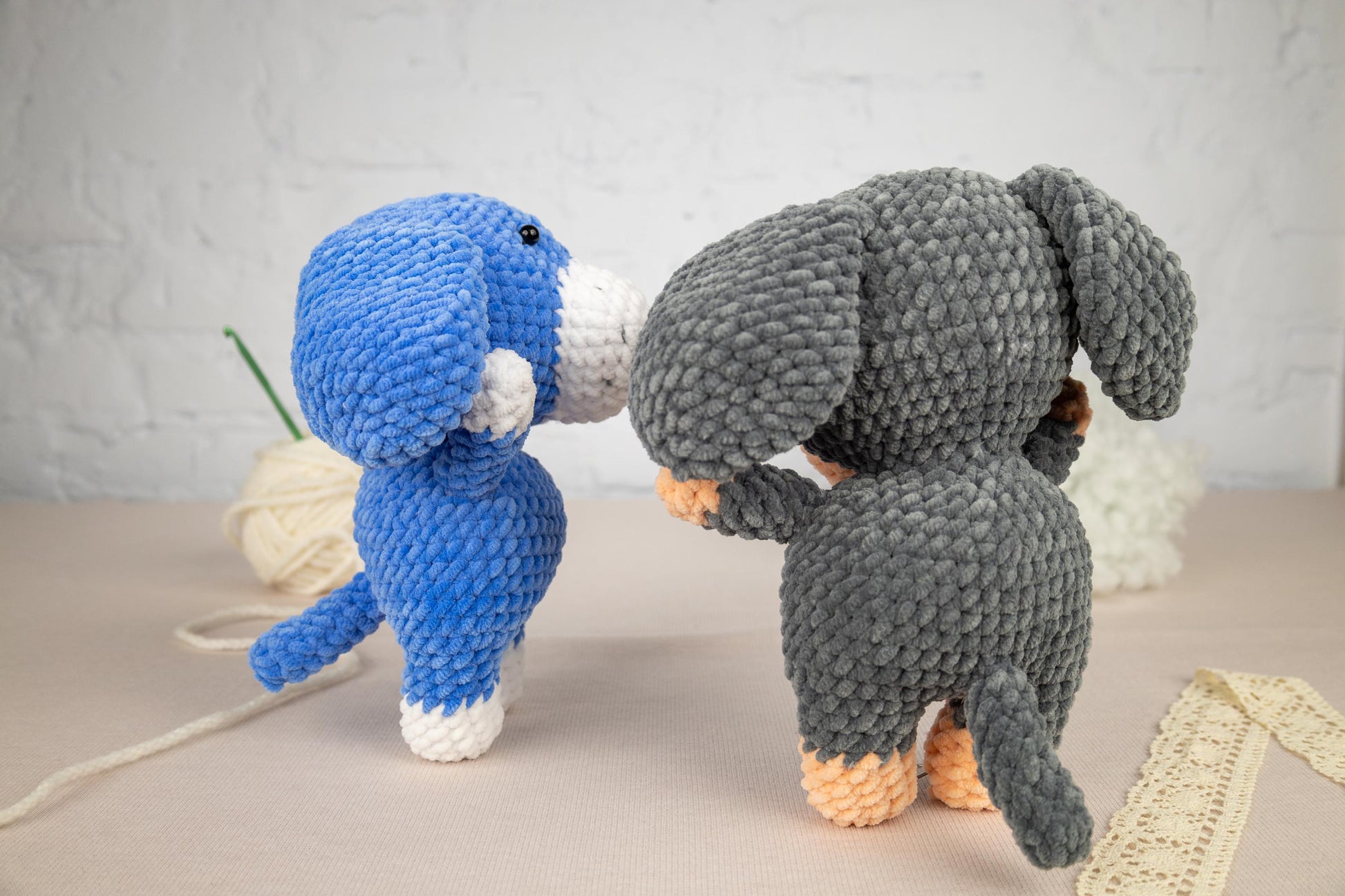 a couple of stuffed animals standing next to each other