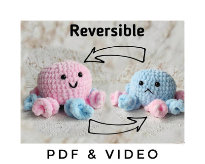 two crocheted stuffed animals sitting next to each other