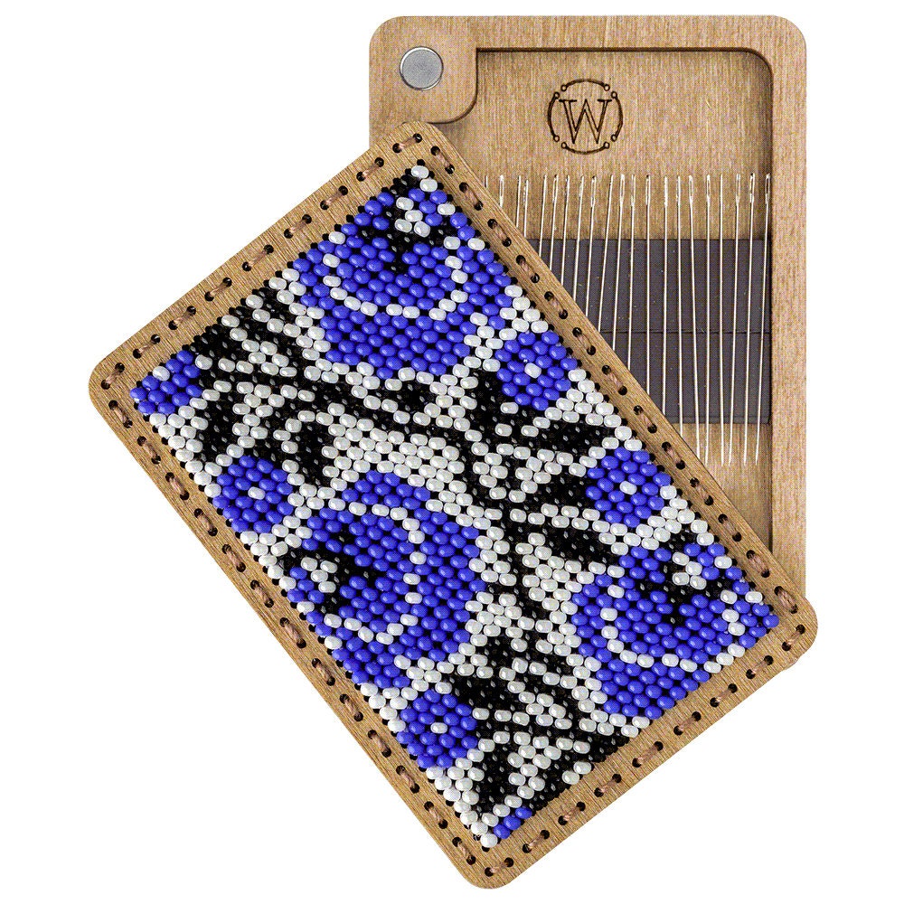 a piece of beaded art on a wooden board