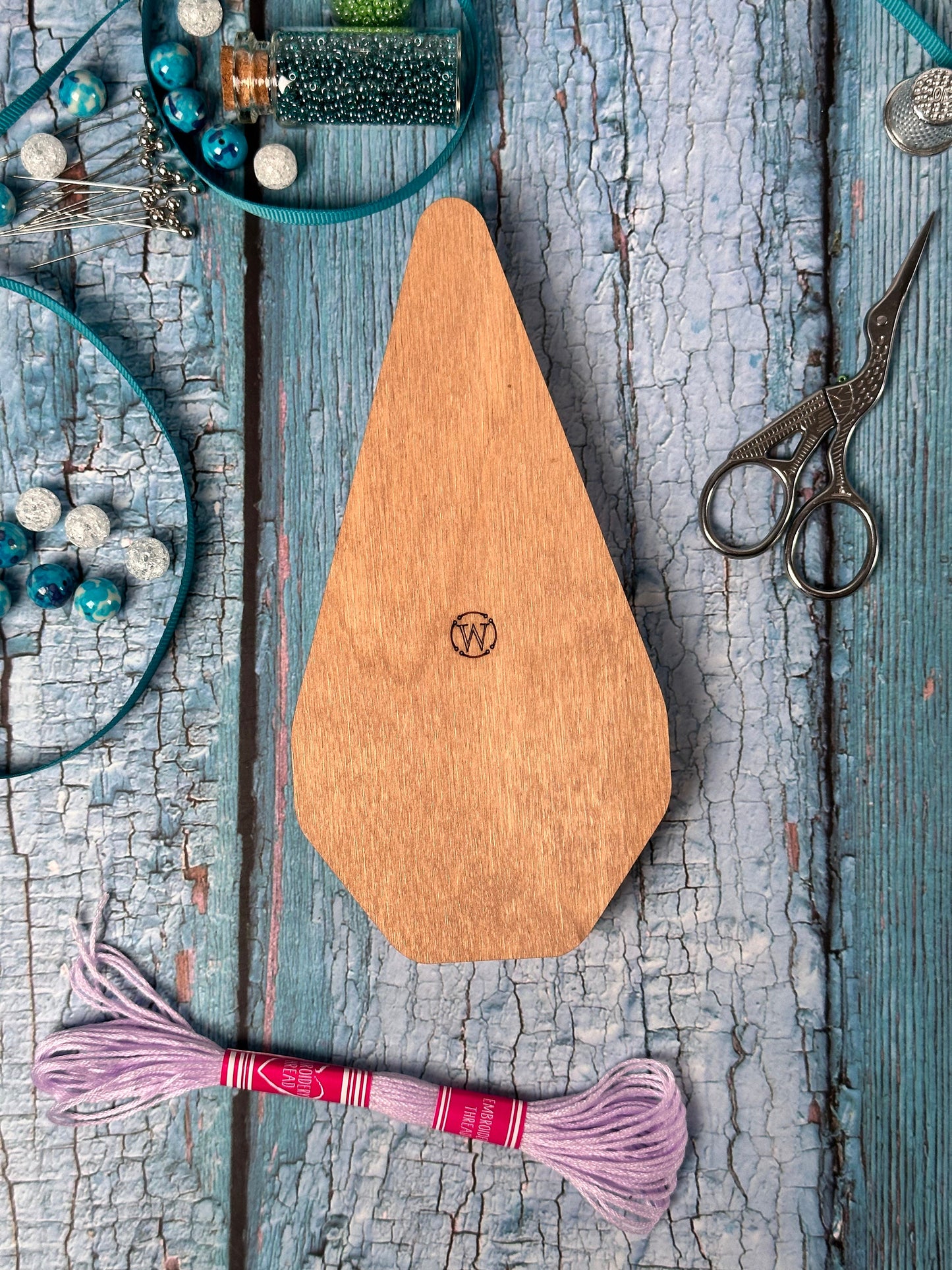 a wooden cutting board sitting on top of a table