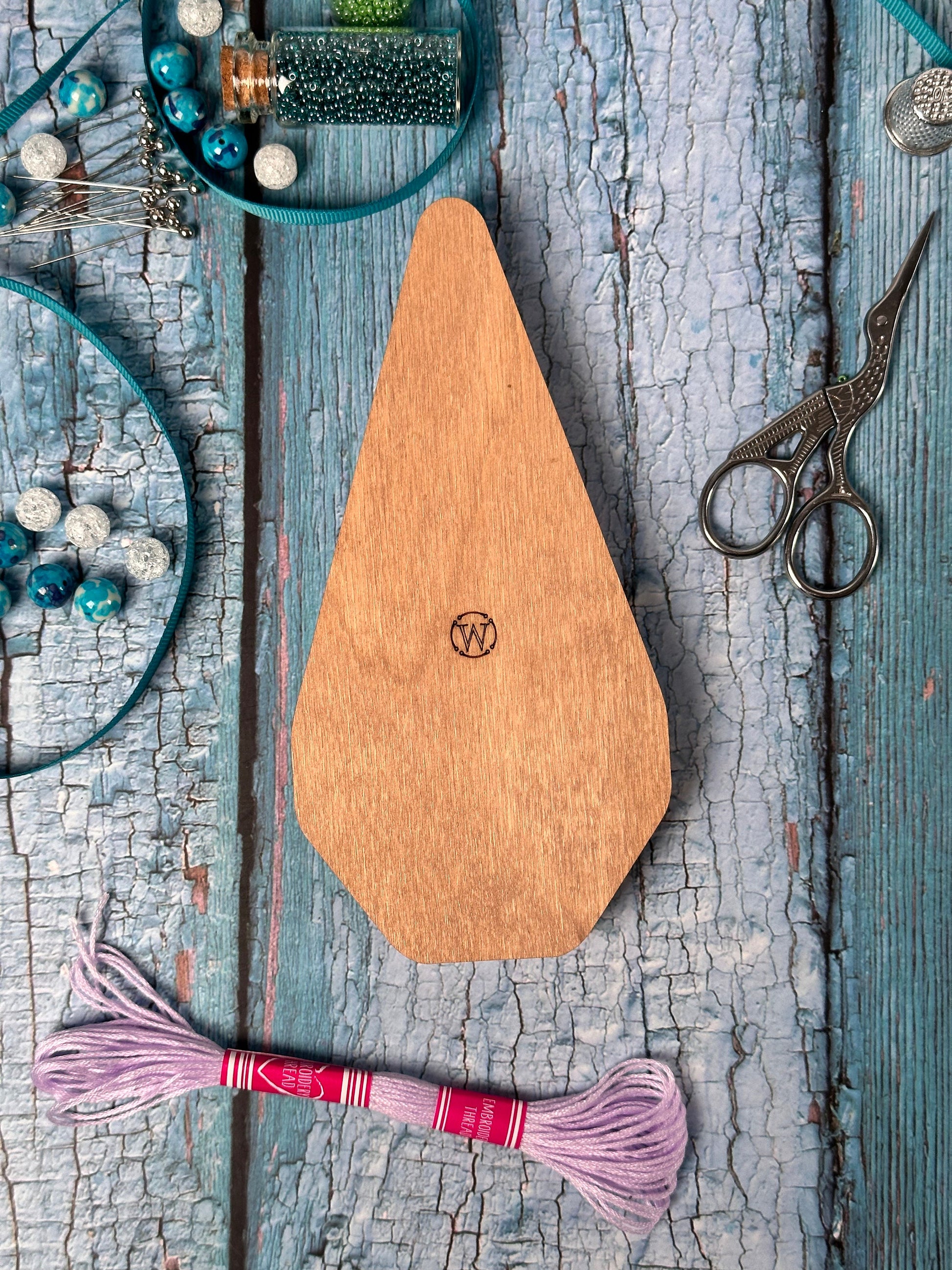 a wooden cutting board sitting on top of a table