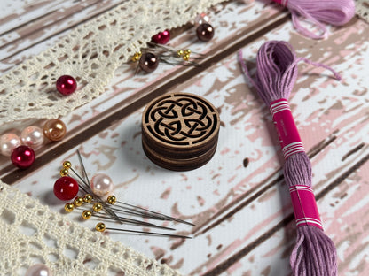 a wooden box sitting on top of a white table