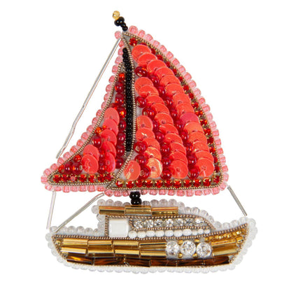 a sailboat made out of beads on a white background