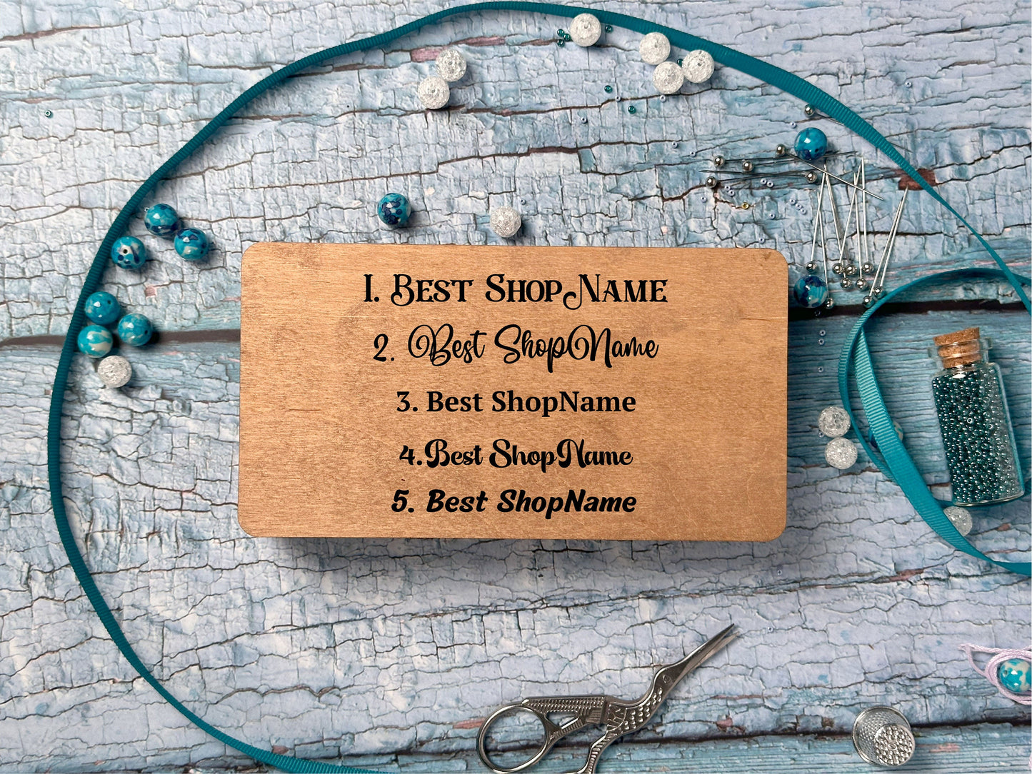 a wooden business card sitting on top of a table