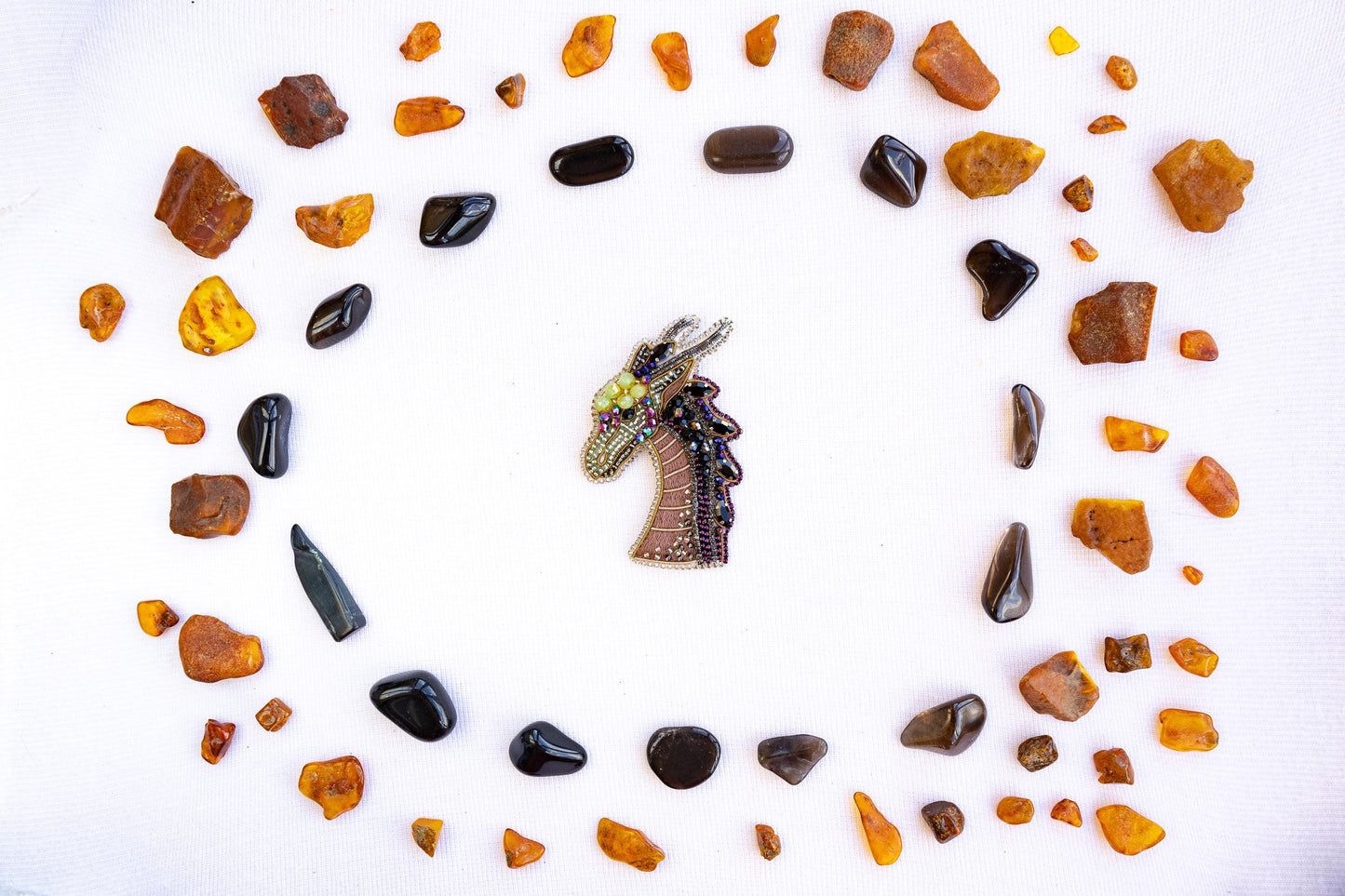 a horse head surrounded by rocks and stones