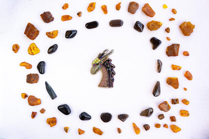 a horse head surrounded by rocks and stones