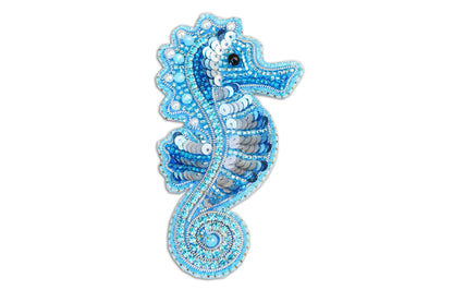 a blue sea horse is shown on a white background