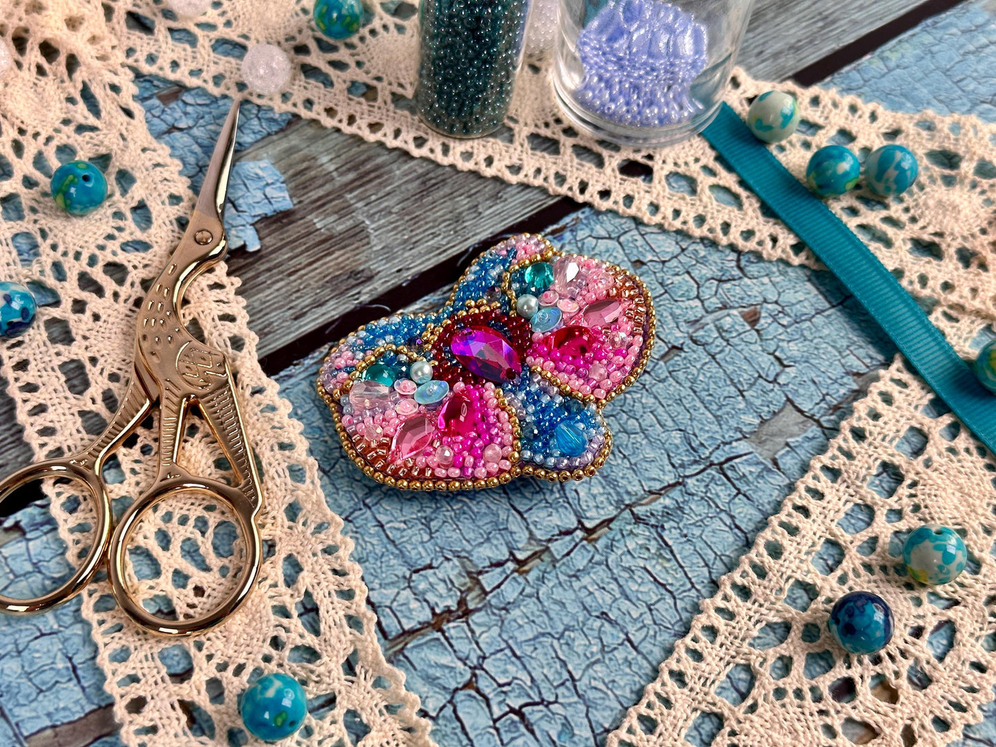 a pair of scissors sitting on top of a table