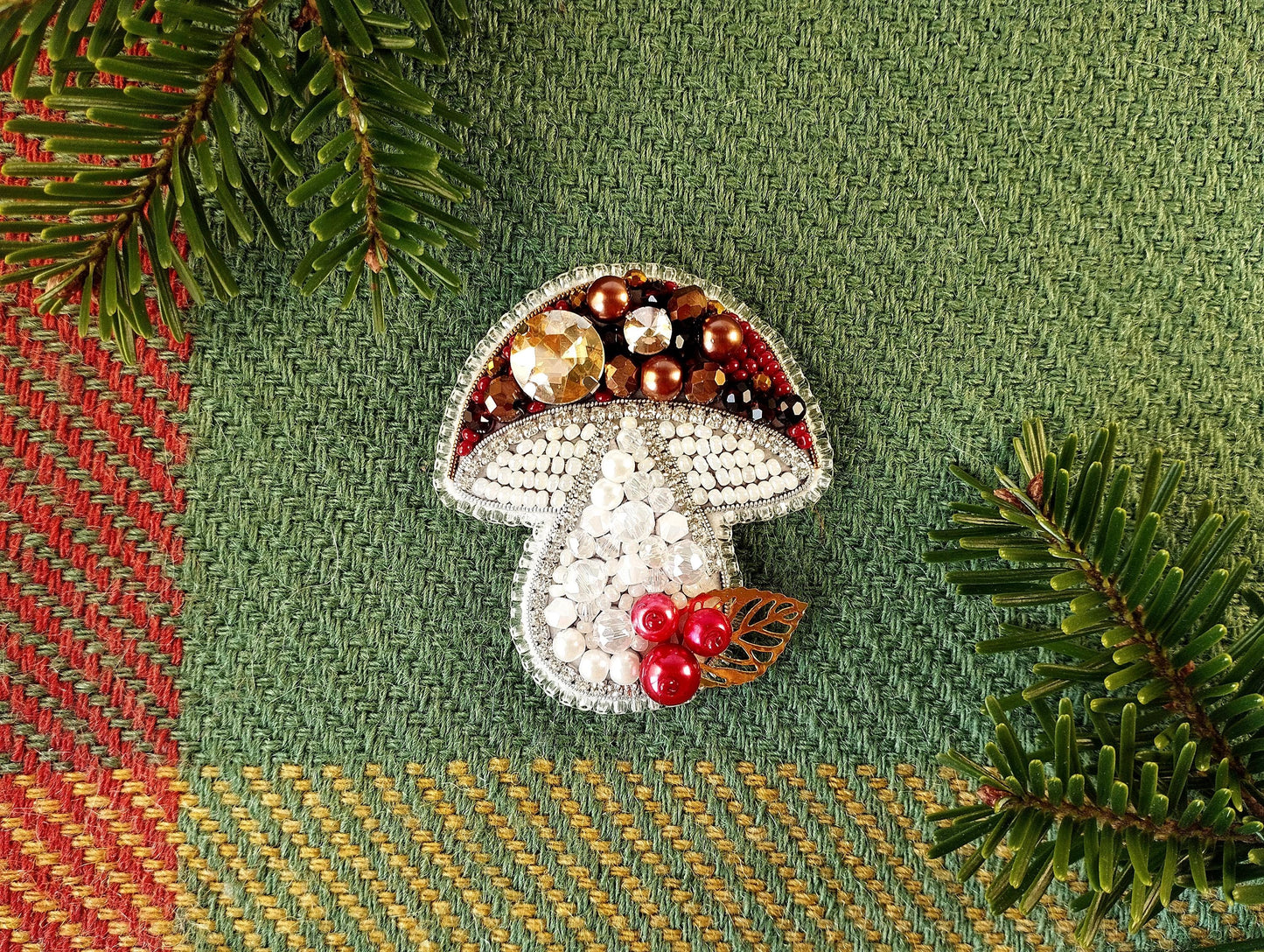 a christmas ornament with a mushroom on top of it