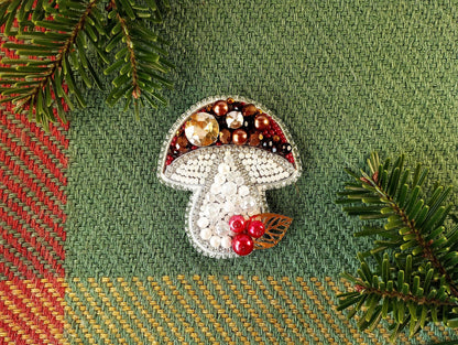 a christmas ornament with a mushroom on top of it