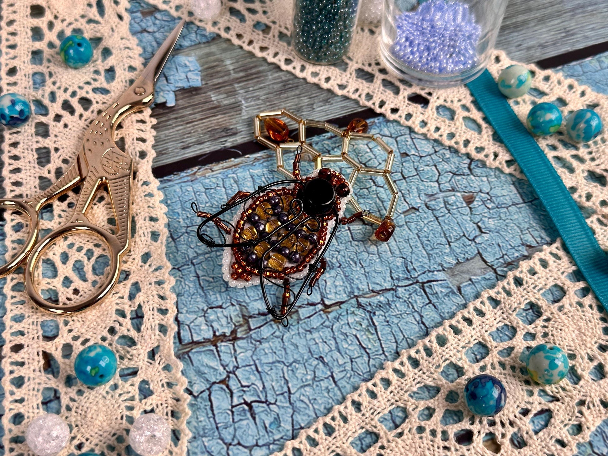 a close up of a pair of scissors on a doily