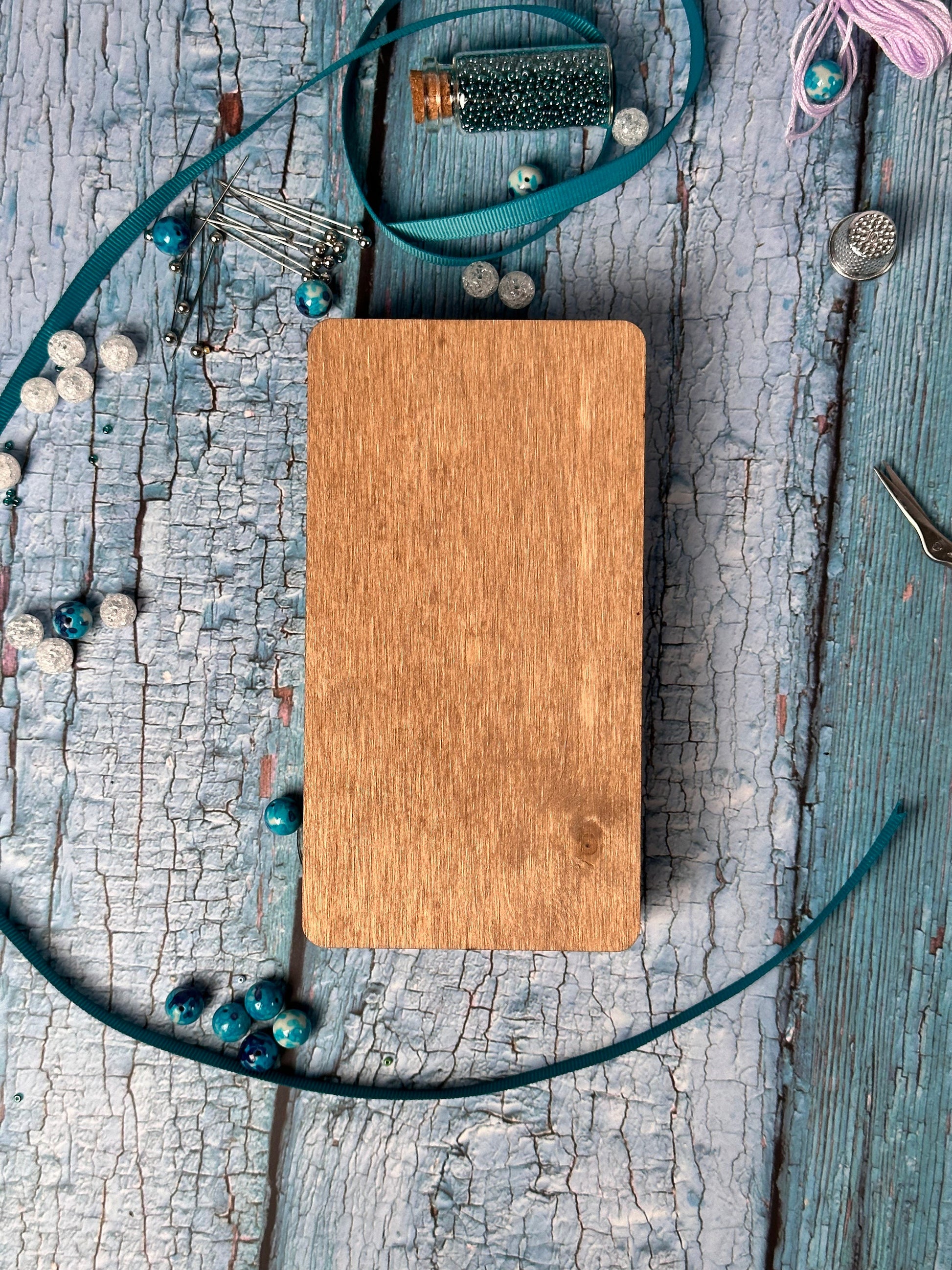 a wooden cutting board sitting on top of a table