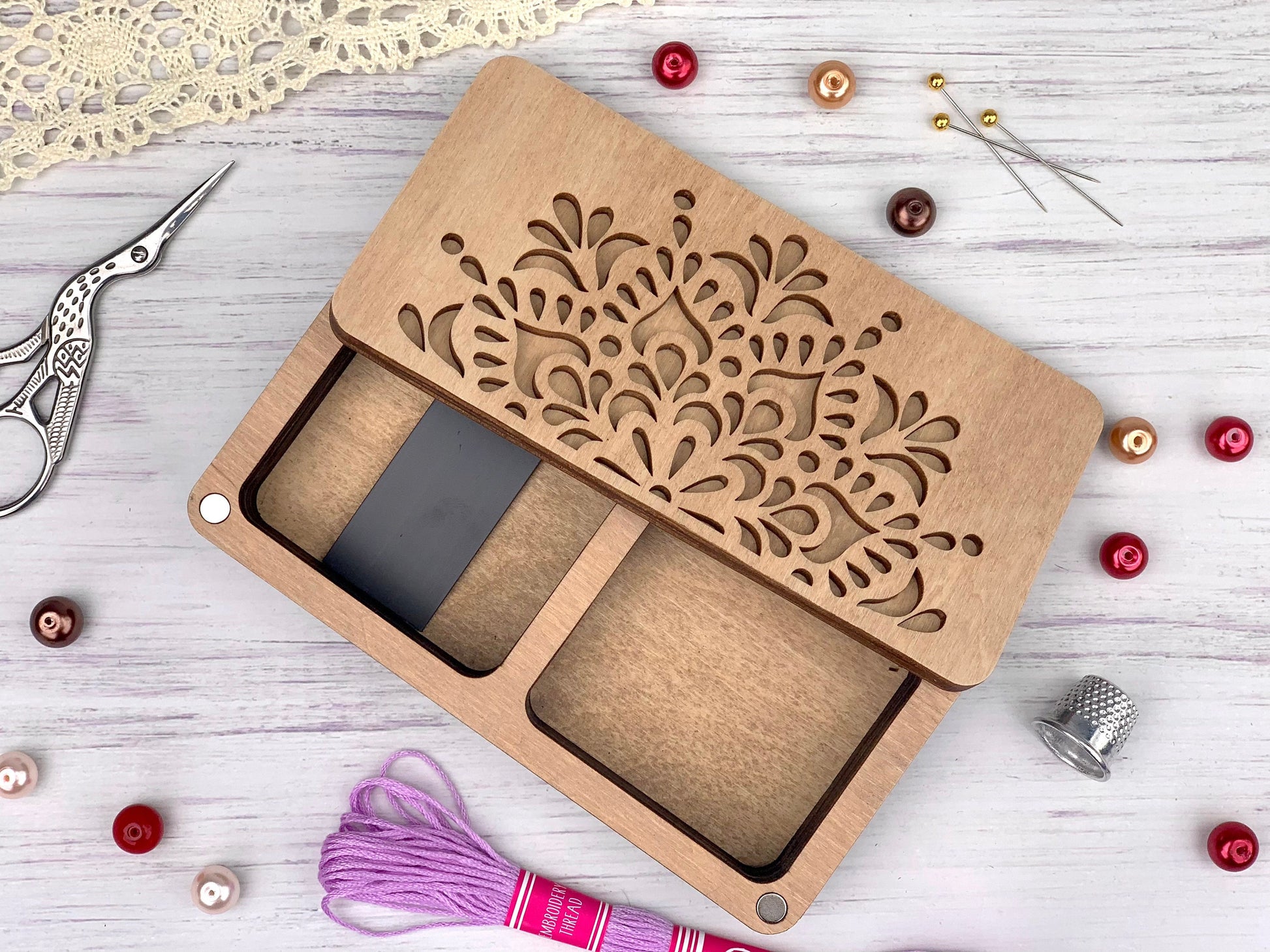 a pair of scissors and a pair of scissors on a table