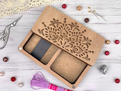 a pair of scissors and a pair of scissors on a table