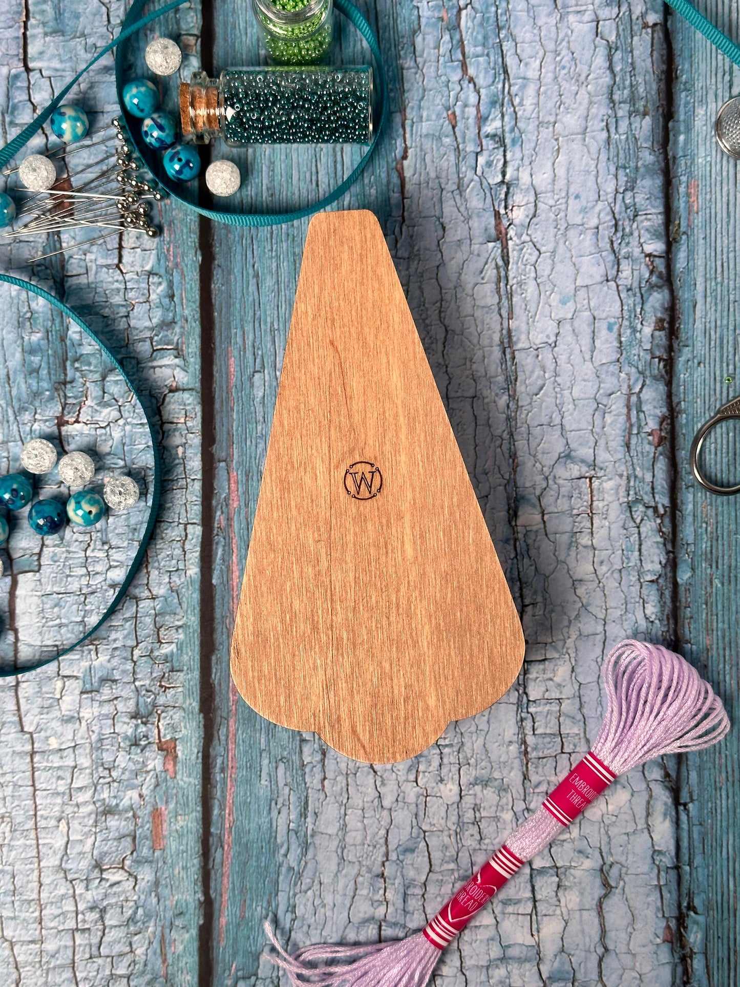 a wooden cutting board sitting on top of a table