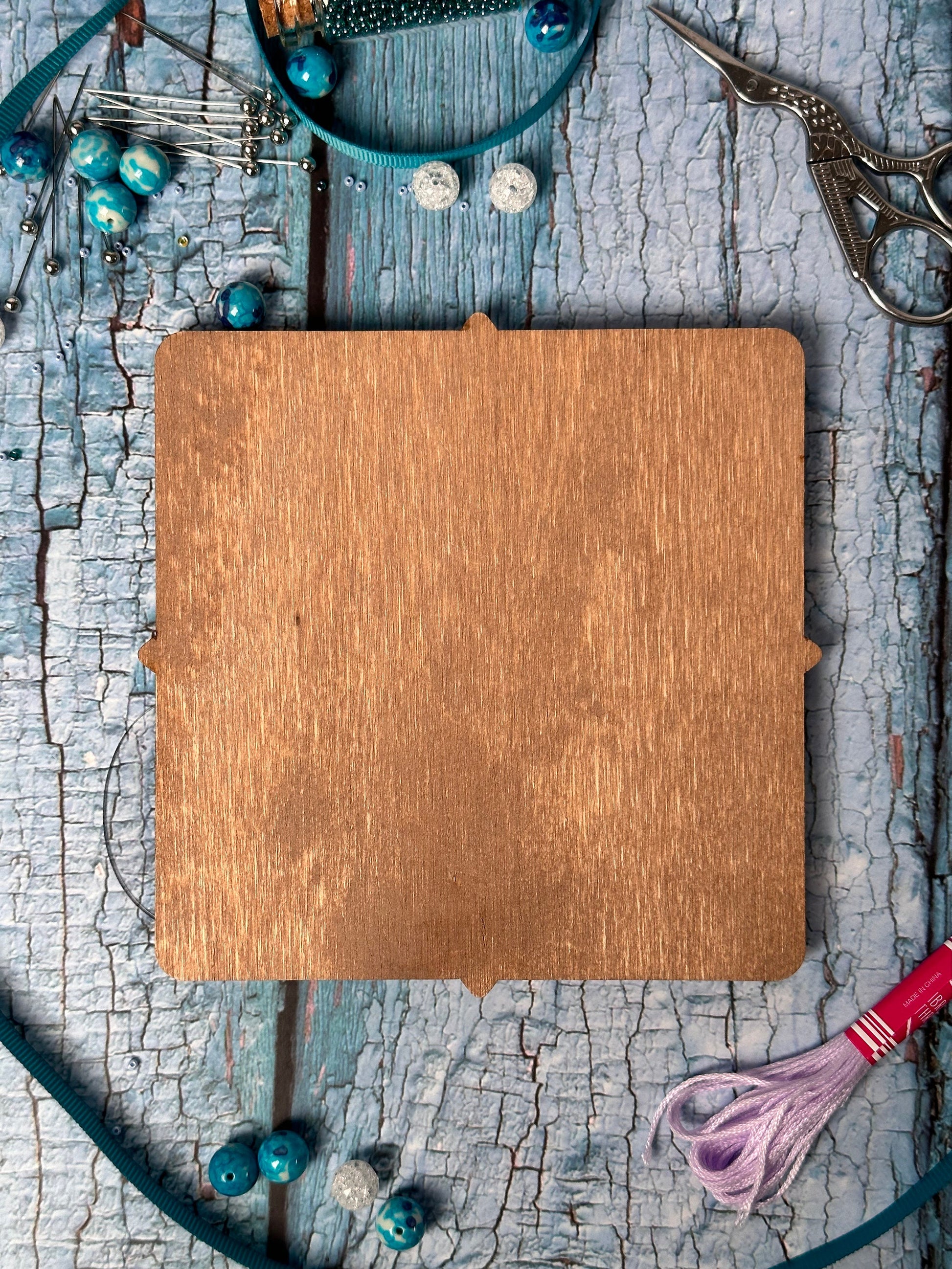 a wooden cutting board sitting on top of a table