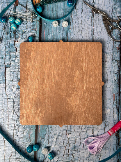 a wooden cutting board sitting on top of a table