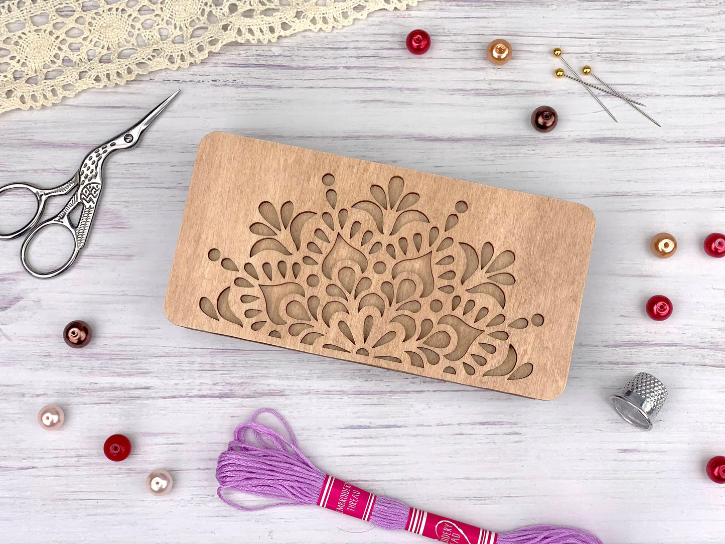 a wooden cutting board with a design on it