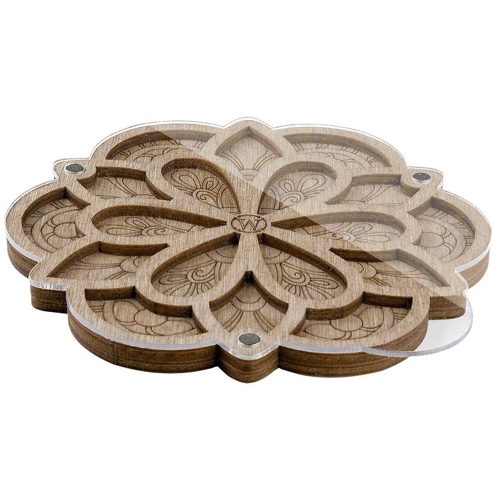 a set of four wooden coasters sitting on top of each other