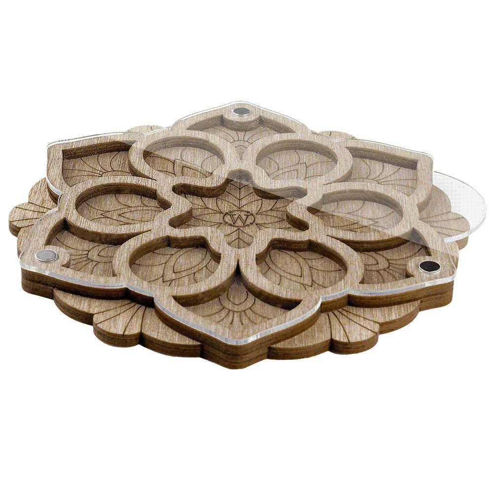 a wooden tray with a flower design on it