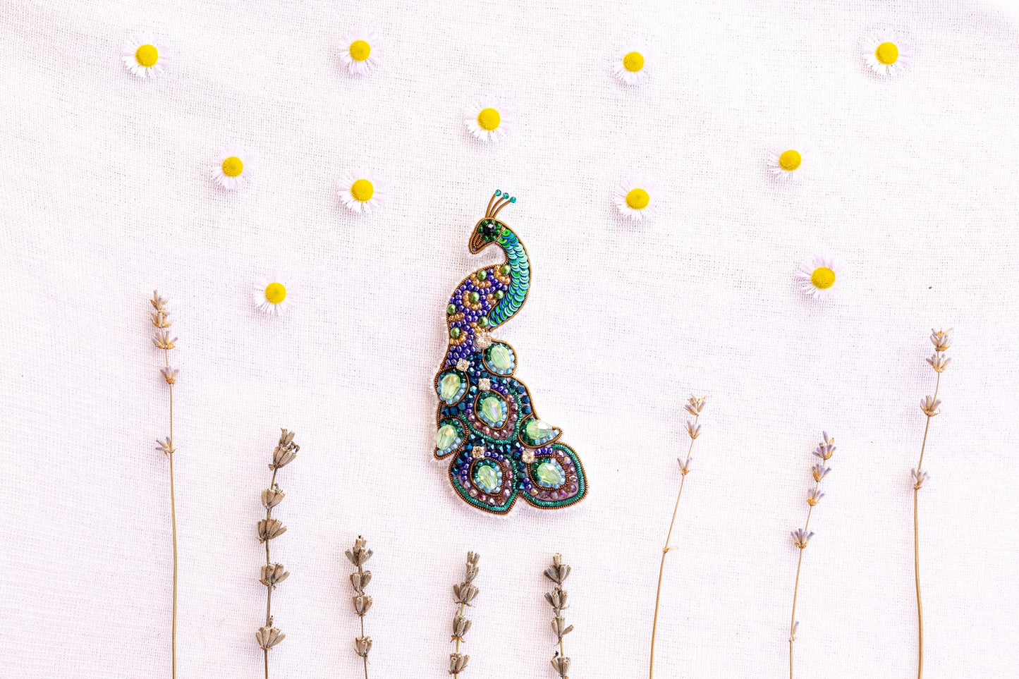 a picture of a brooch sitting on top of a table