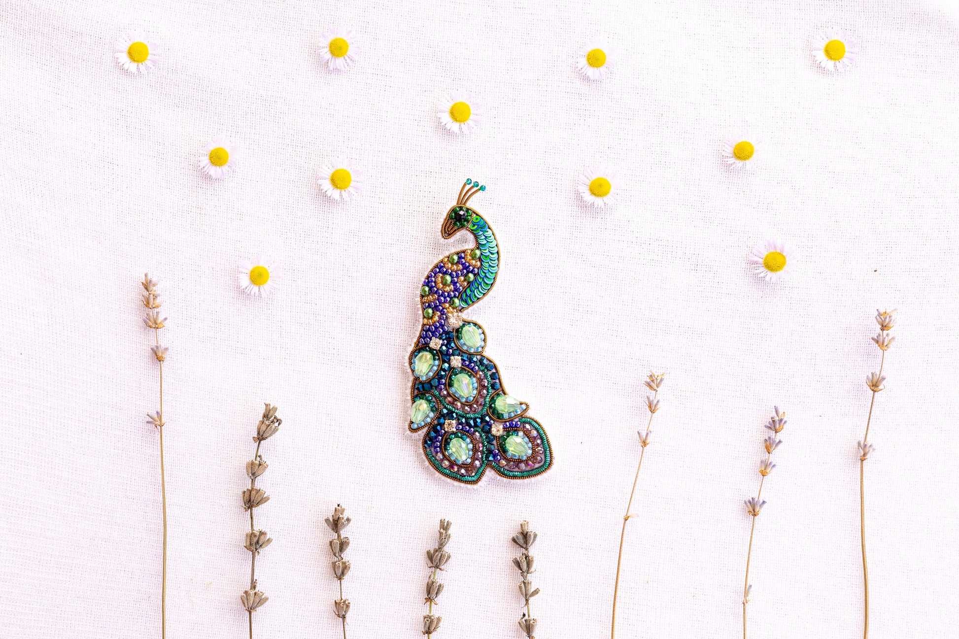 a picture of a brooch sitting on top of a table