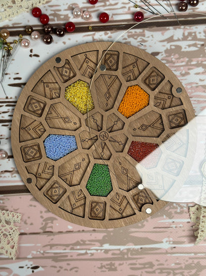 a wooden board with a bunch of beads on it