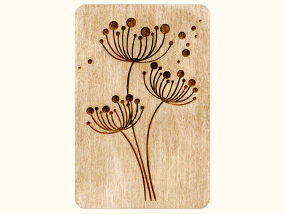 a wooden stamp with a picture of flowers on it