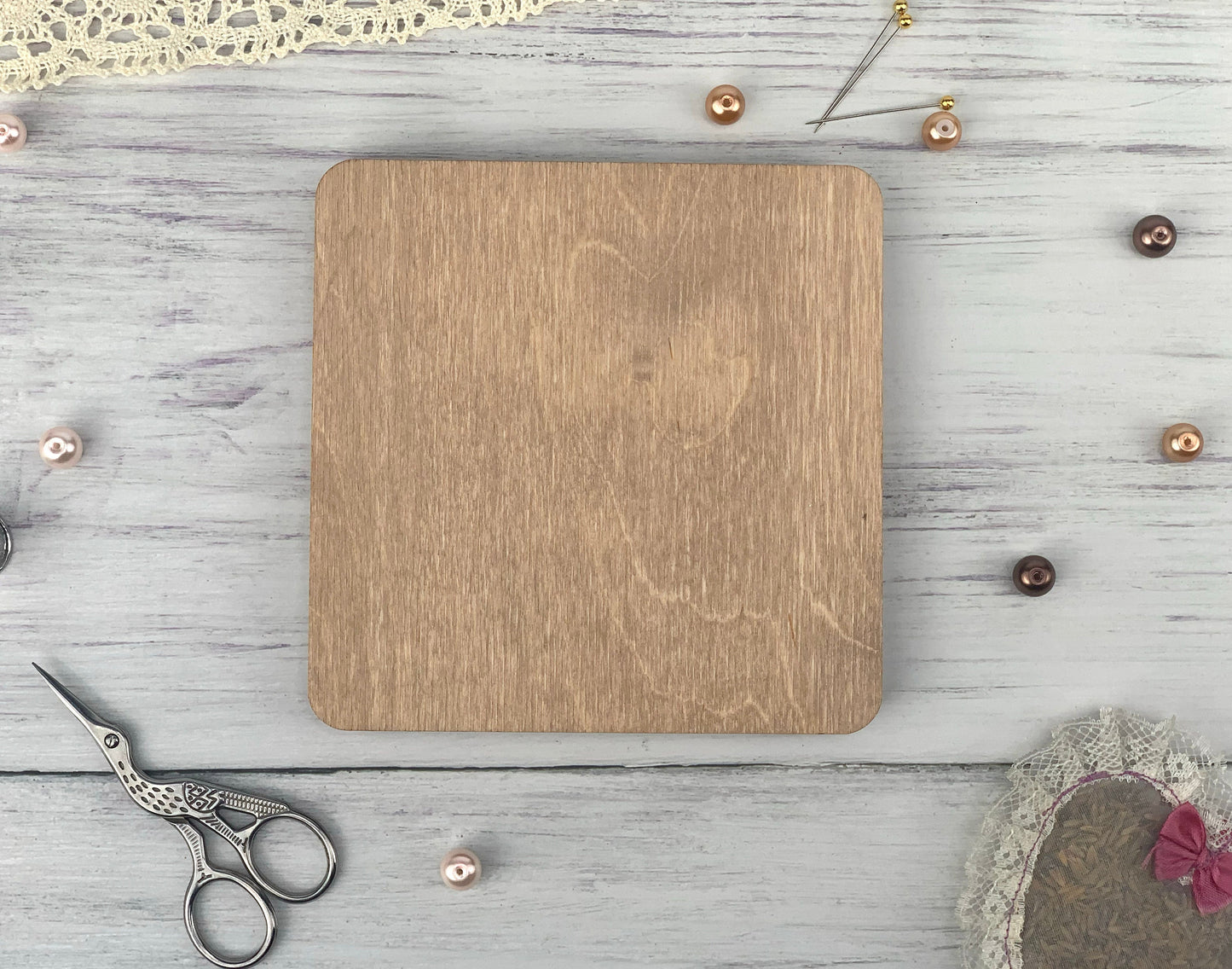 a wooden cutting board sitting on top of a table