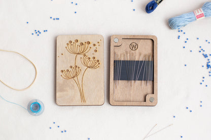 a couple of wooden cards sitting on top of a table
