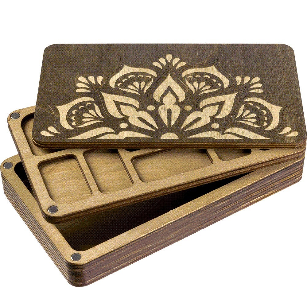 a couple of wooden trays sitting on top of each other