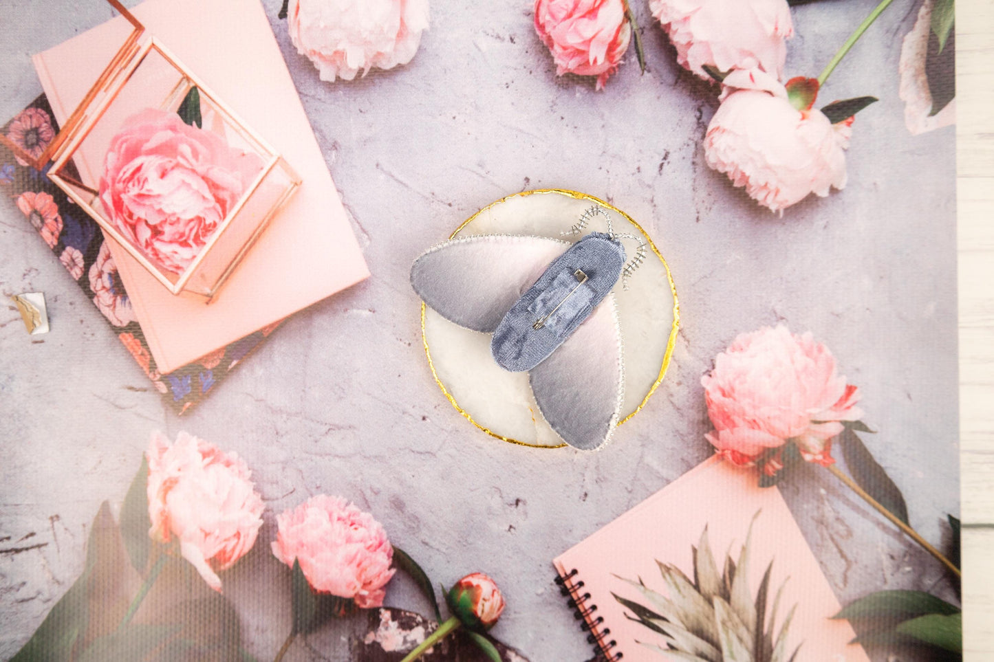 a table topped with lots of pink flowers